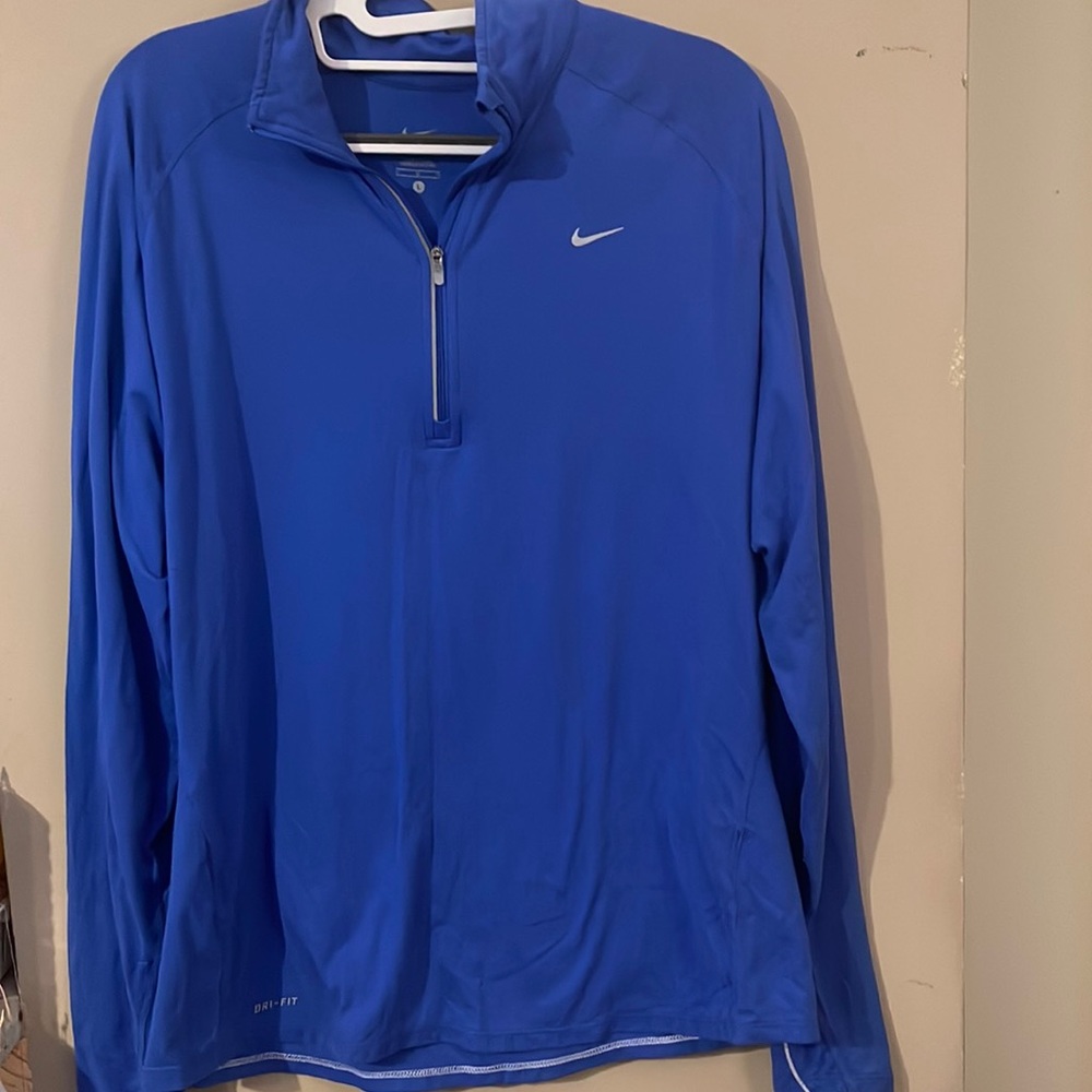 Nike Women's Dri Fit 1/4 zip pullover. Royal blue. Size Large